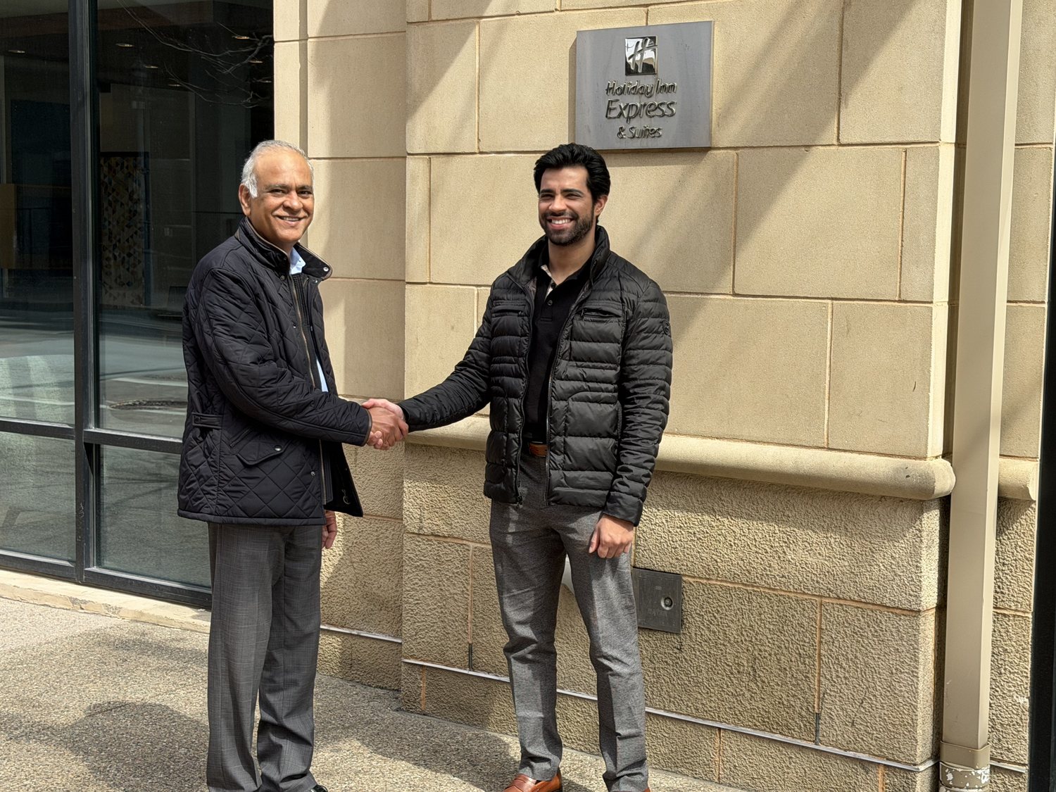 Two generations of the Banwari family outside the Holiday Inn Express and Suites Pittsburgh North Shore